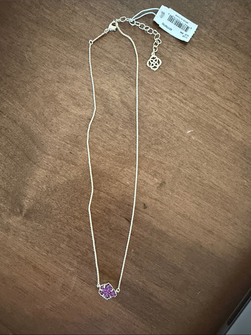 Kendra Scott gold Tess with purple drusy.